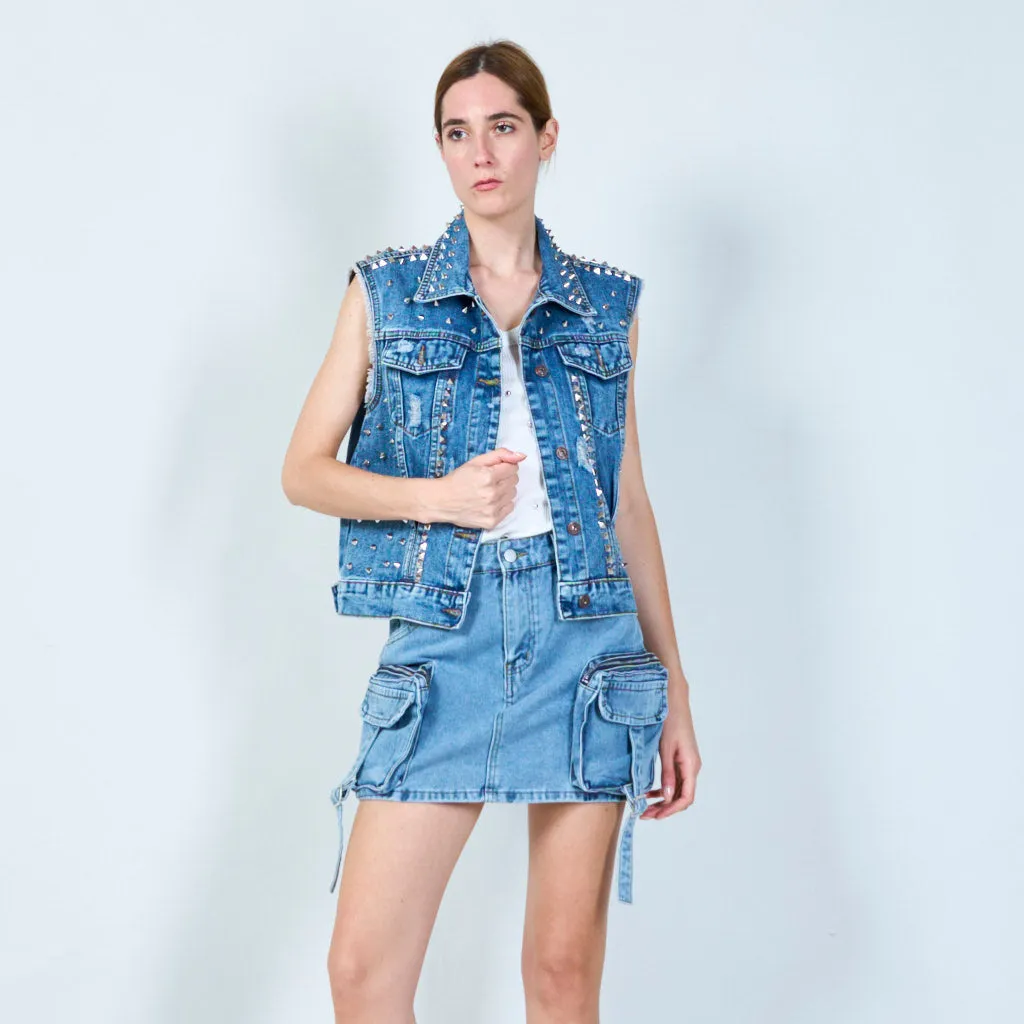 Distressed sleeveless denim jacket with stud embellishments wholesale